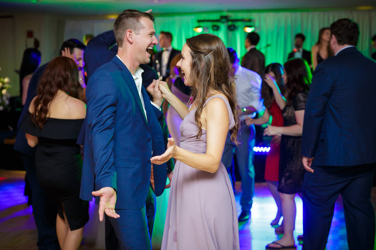 Wedding guests dancing together