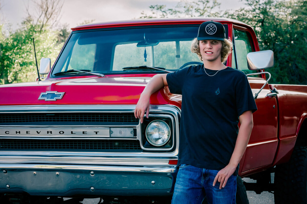 Red vintage Chevy truck featured in Prescott boy's senior photos
