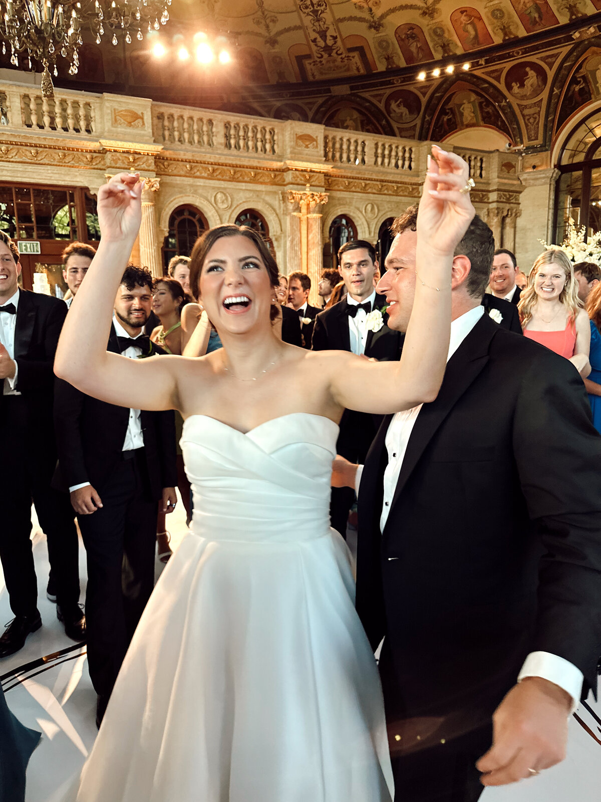LIZZIE HANDS IN THE AIR