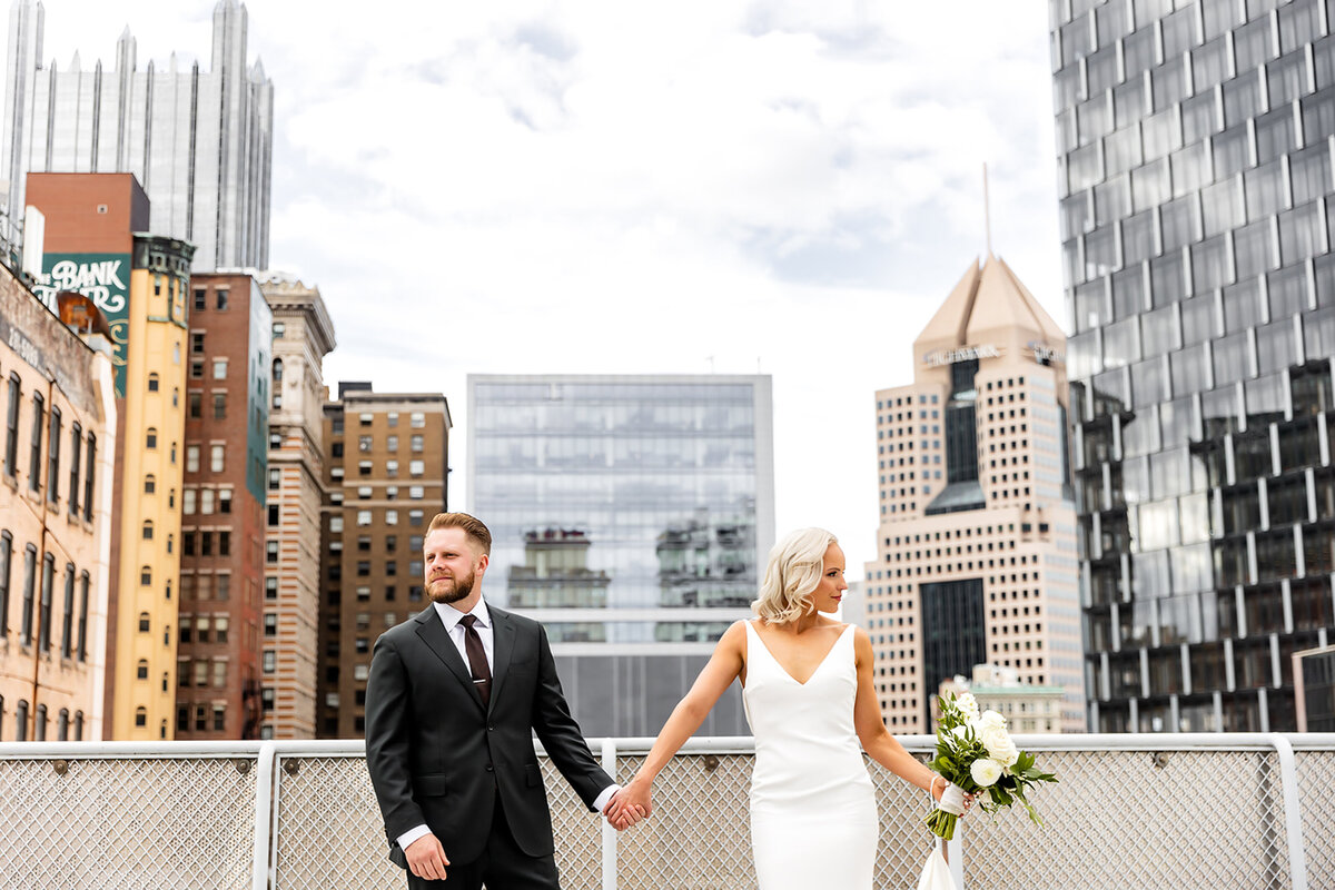 Bride and groom walk up memorial steps at their DC wedding
