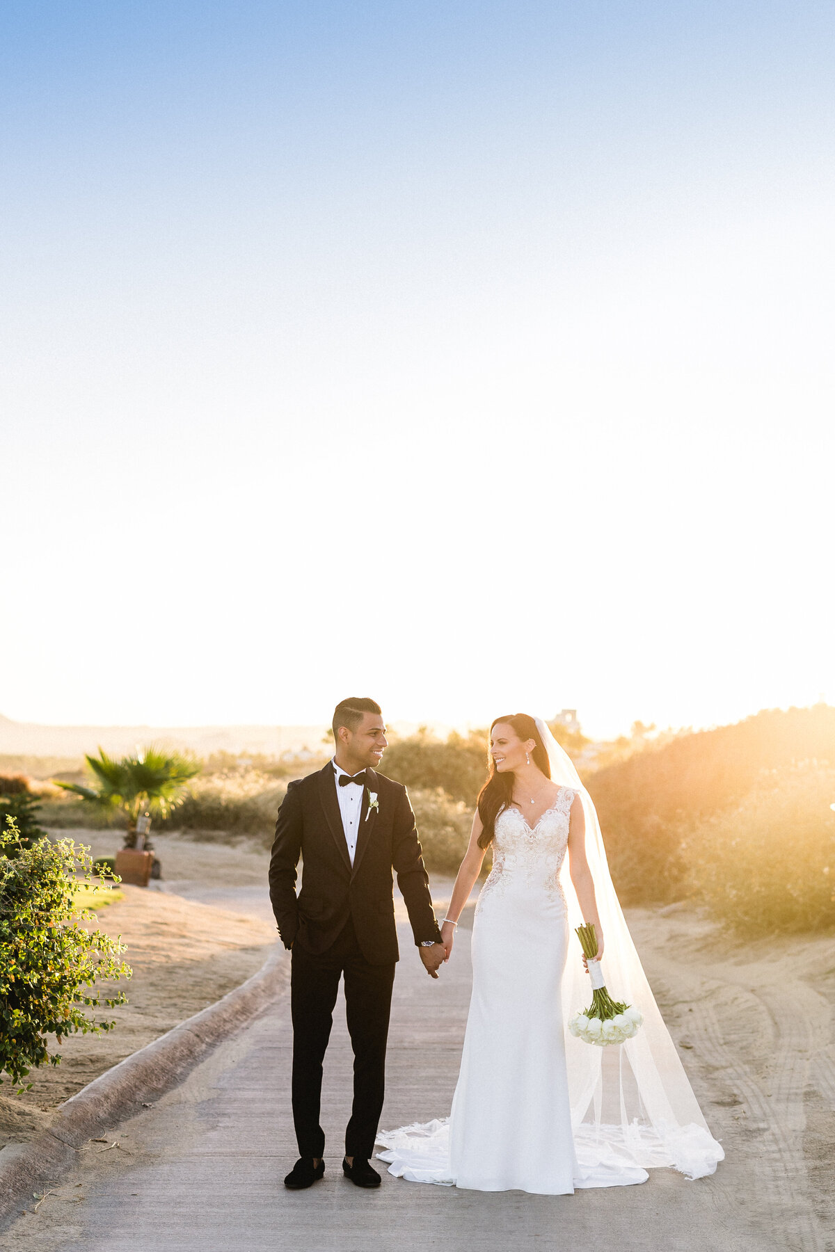 Pops of burgundy, blush, and burnt orange have us dreaming in color. For this sweet, springtime elopement Nicole Hensley created a day that's all about style. From ceremony stairs beautifully blooming with flowers to a reception table overflowing with romantic florals, designs by Remi and Gold delight. You'll swoon over every last detail beautifully captured in the imagery by Lucy Struve.