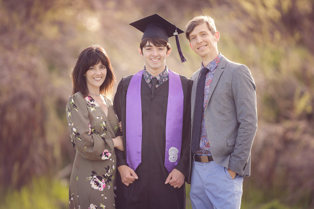 Thornton-Denver-Broomfield-Colorado-High-School-Senior-Photos-Photography-Yvonne-Min-Sunset-Nature-Natural-Light-Family-Black-Sash-Honors-Cap-and-Gown-Graduation-Celebrate-Outside-Legacy-Erie-Mountain-Range-Horizon-Boys-Stargate-Family-Mom-Dad-4005