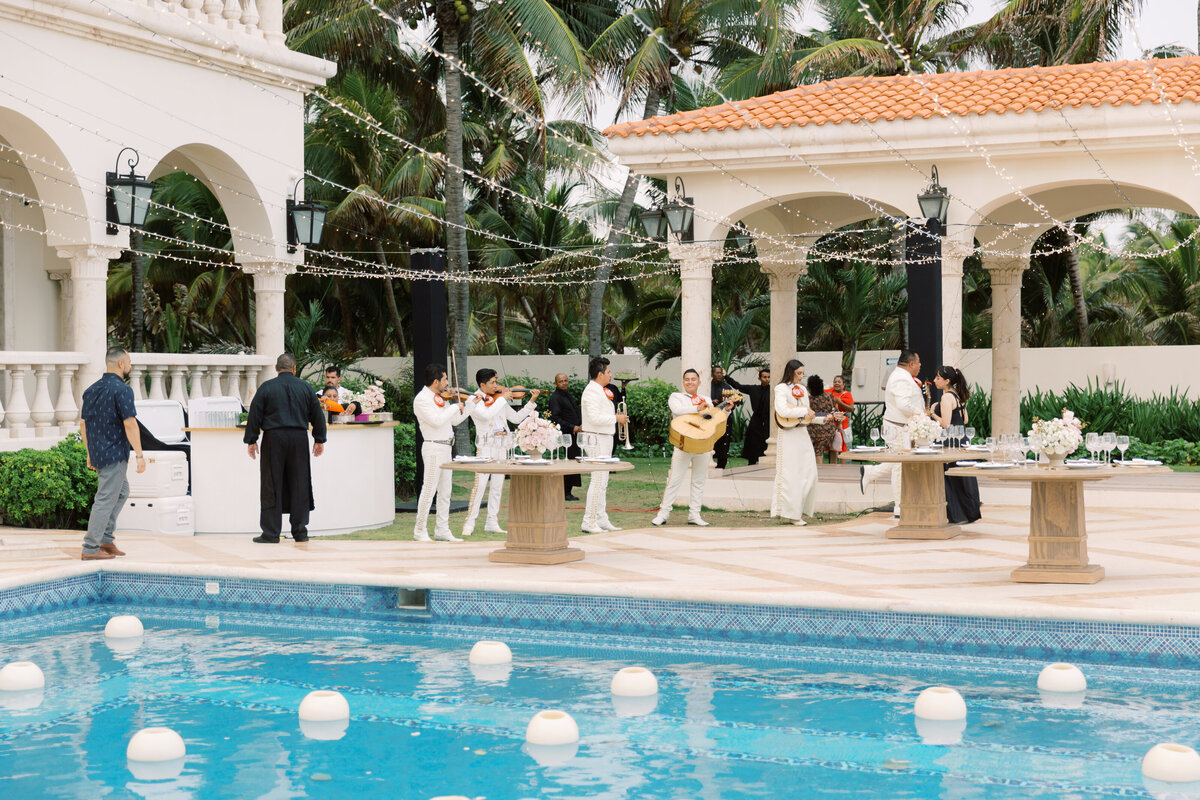 A vibrant, music-filled wedding with mariachi and a poolside reception.
