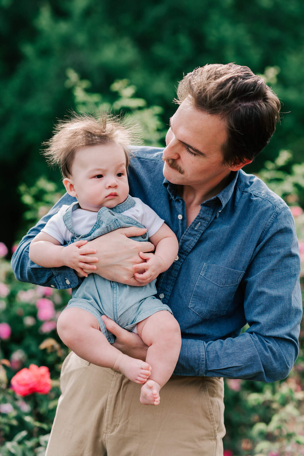 A father holding his son, taken by a northern virginia family photographer