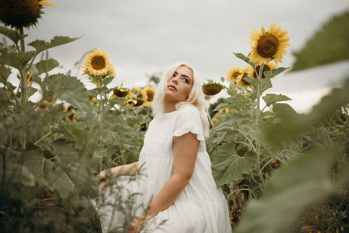 Portrait in sunflower field