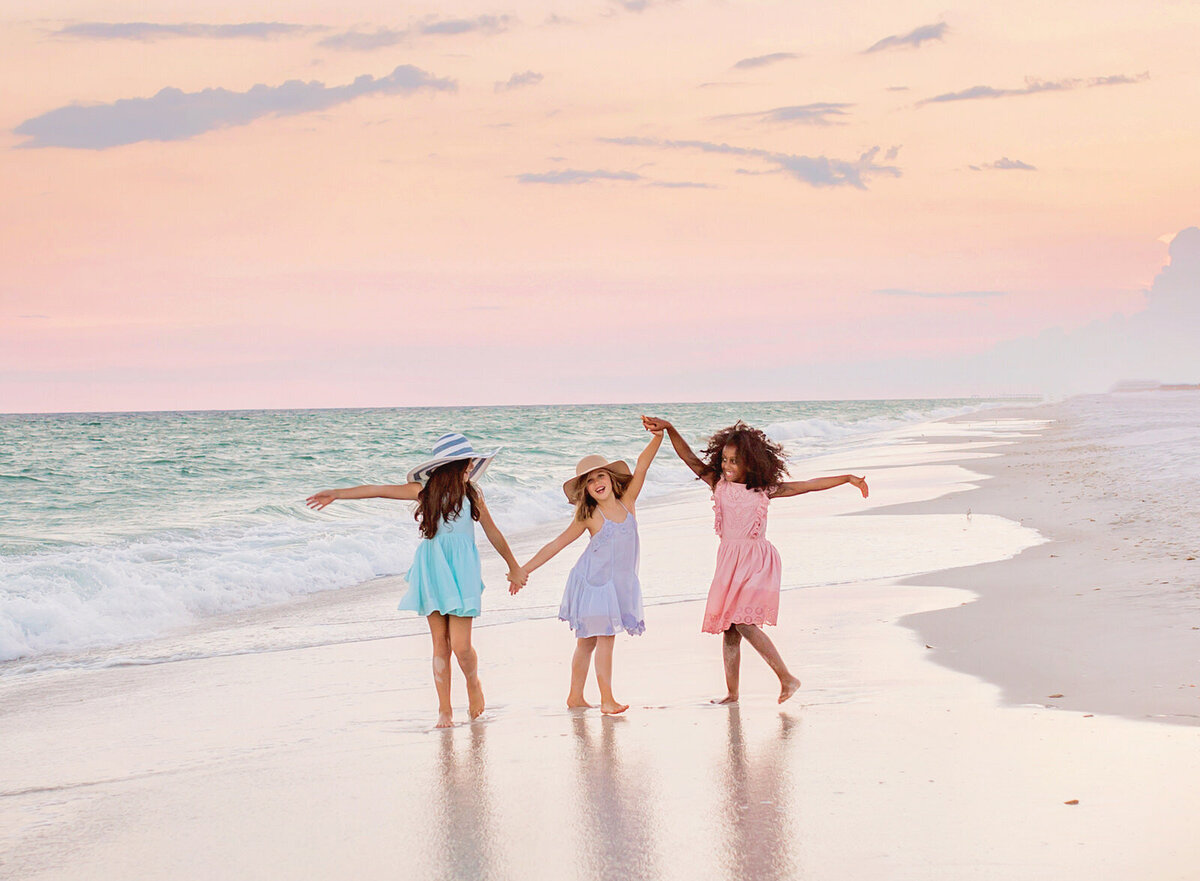 three-girls-dancing-by-gulf-of-mexico