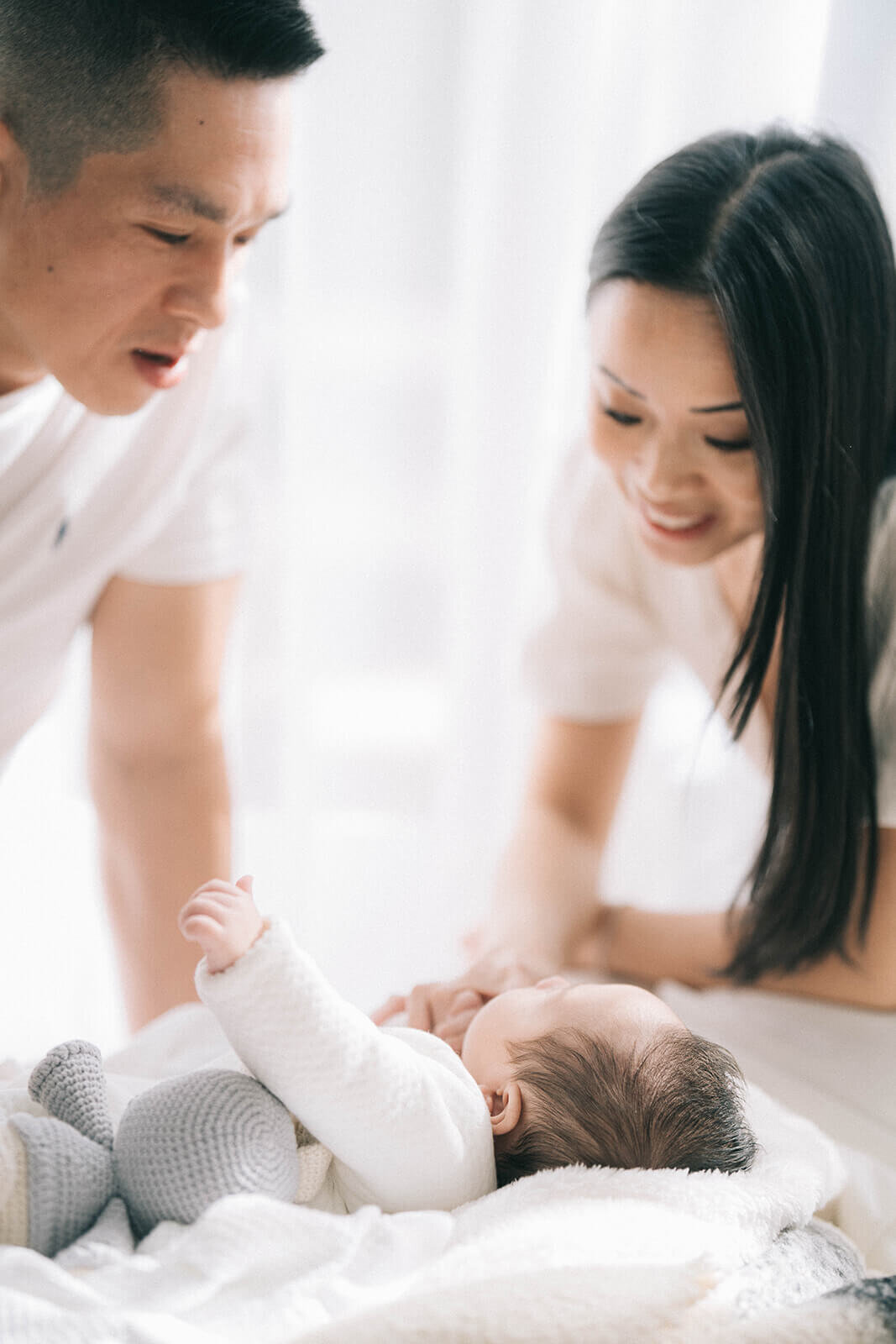 Inner-west-newborn-photography-parents-and-baby-playing-in-living-room