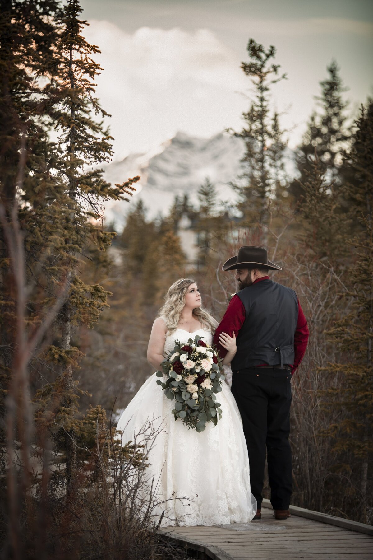 Wedding portrait on a path in the mountains