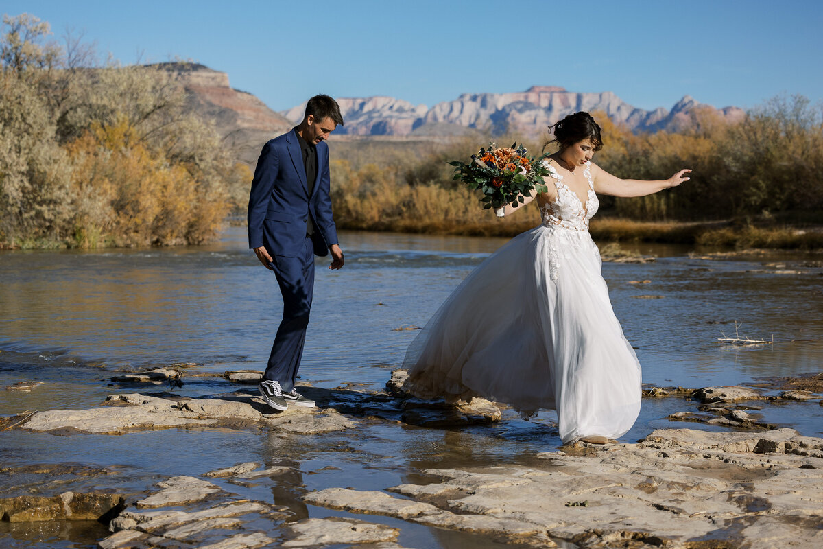 couple wearing hiking boots and fancy clothes
