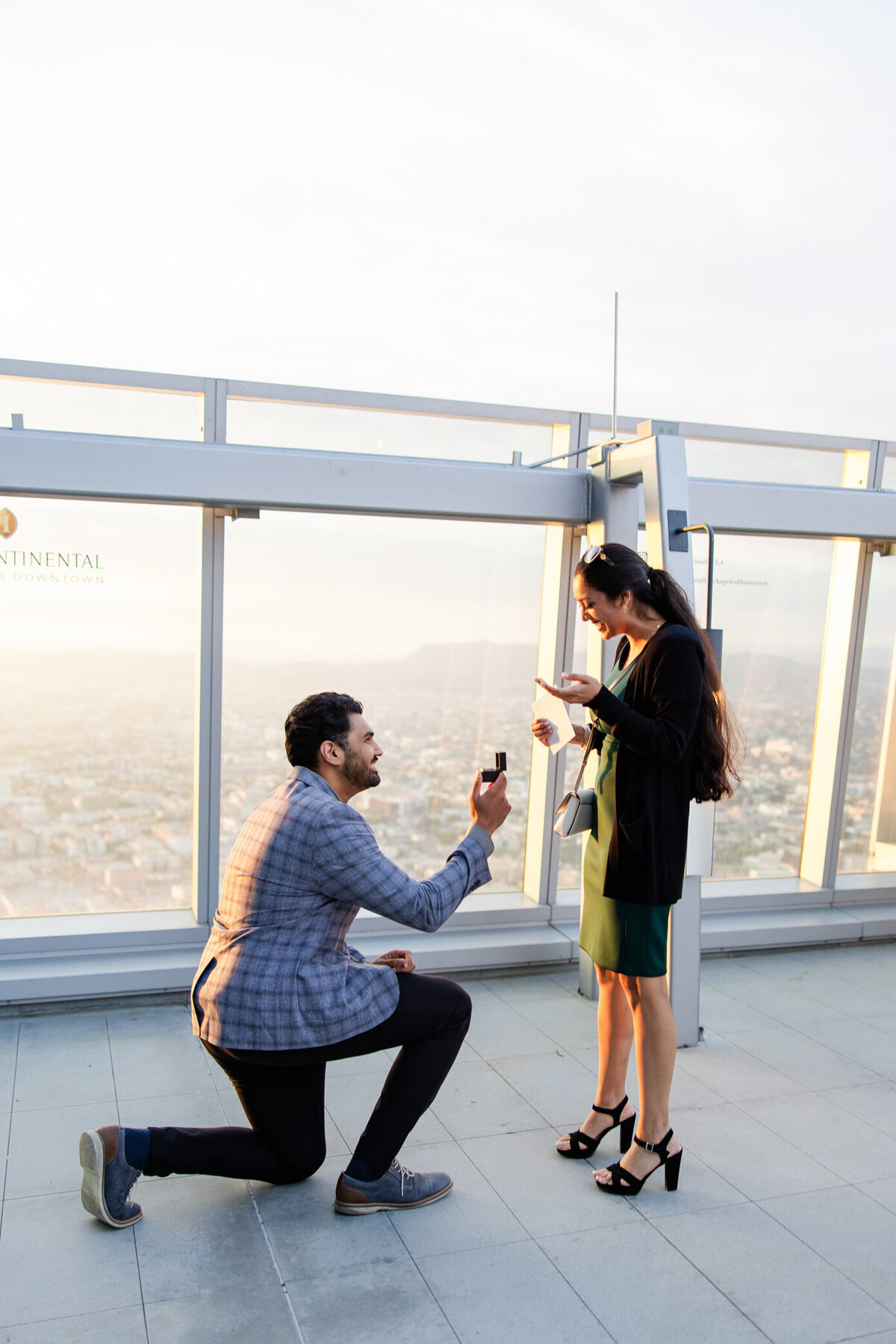 surprise proposal on a city rooftop