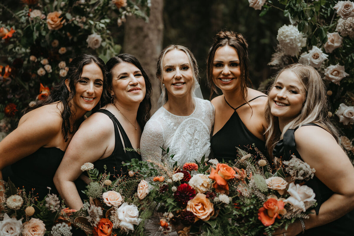 dark fall bride and bridesmaids wedding