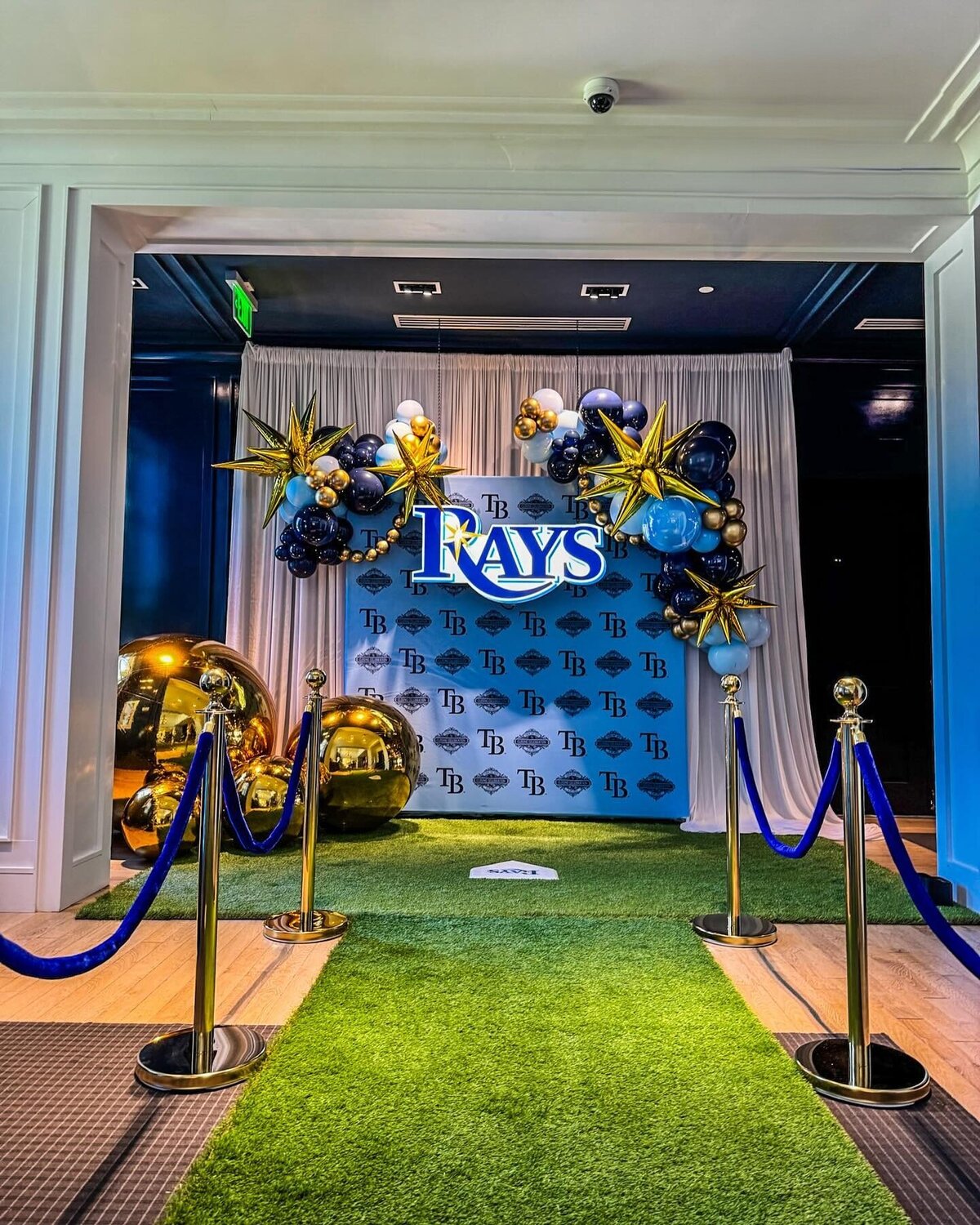 Rays balloons with backdrop for event in St. Pete