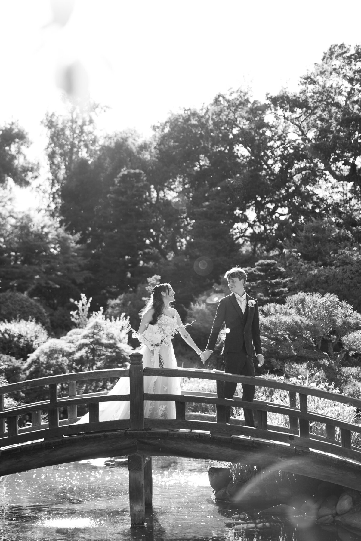 Bride and Groom posing in tea garden