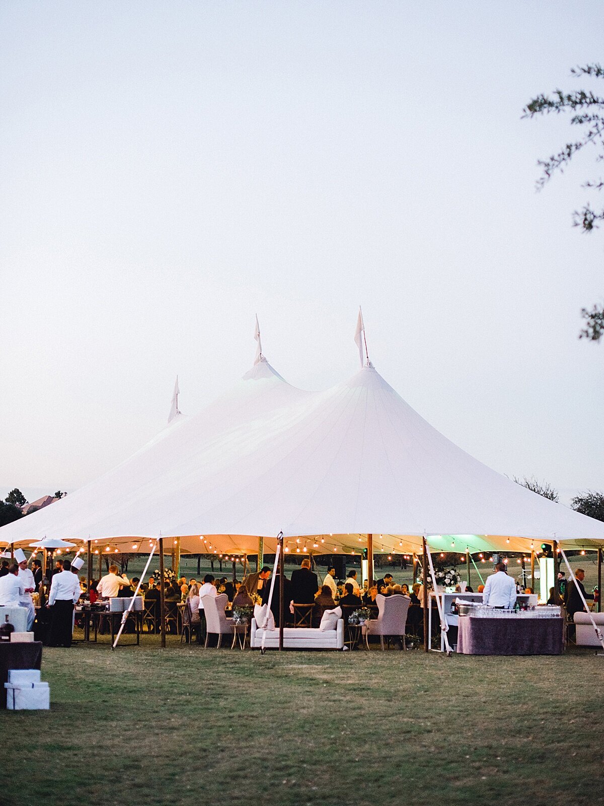 Tented wedding at Dallas Forth Worth Four Seasons with wedding florals by Vella Nest Floral Design