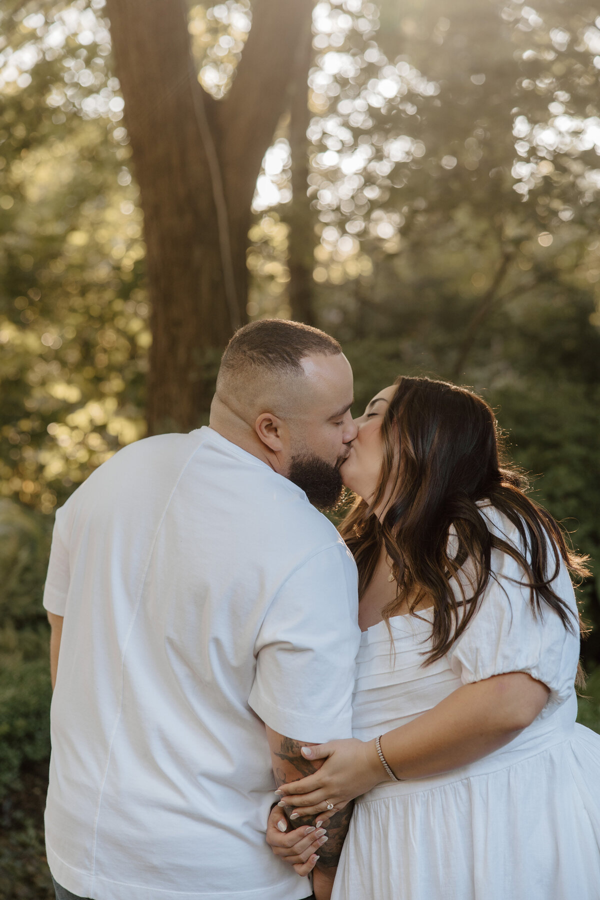 cute-engaged-couple-kissing-meg-pearson-photography-midwest
