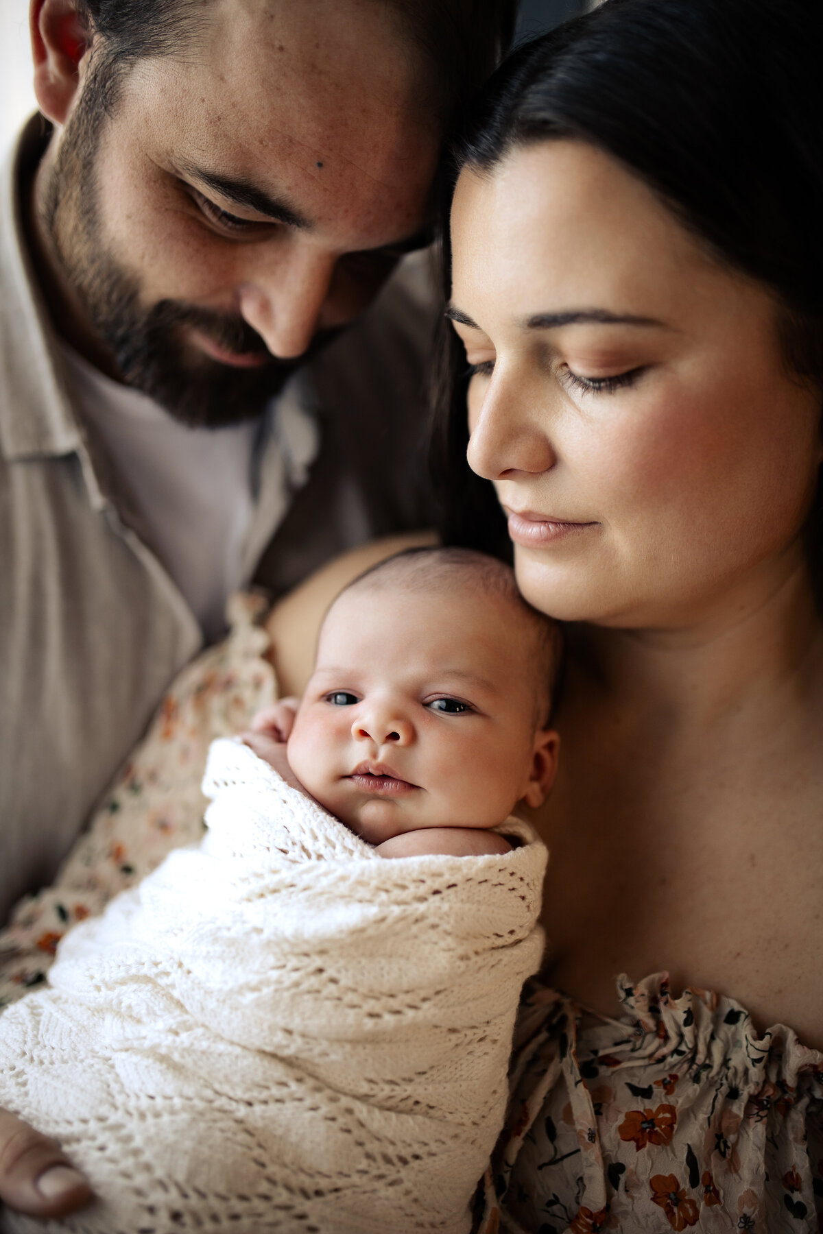 Newborn baby yawning peacefully in a cozy Hawke’s Bay home – heartwarming newborn photography by a local Hawke’s Bay photographer, capturing tender moments in Napier, Hastings, and Havelock North