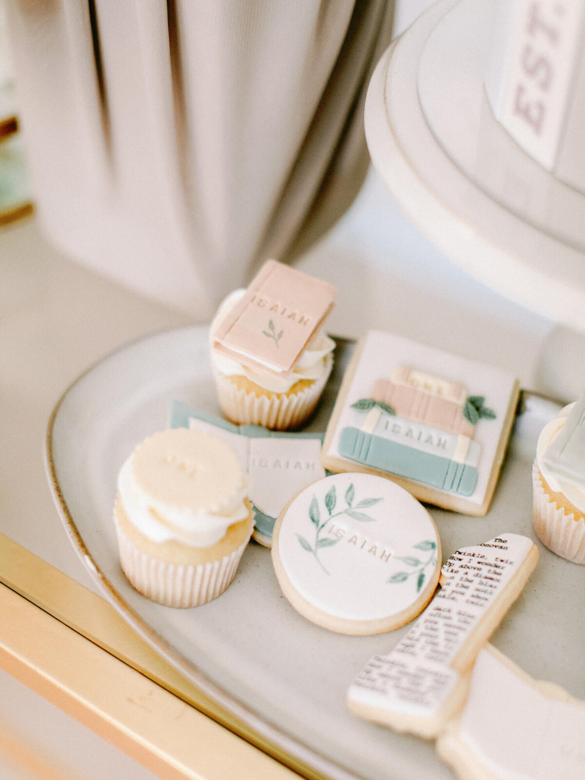 cookies and cupcakes stamped with isaiah 