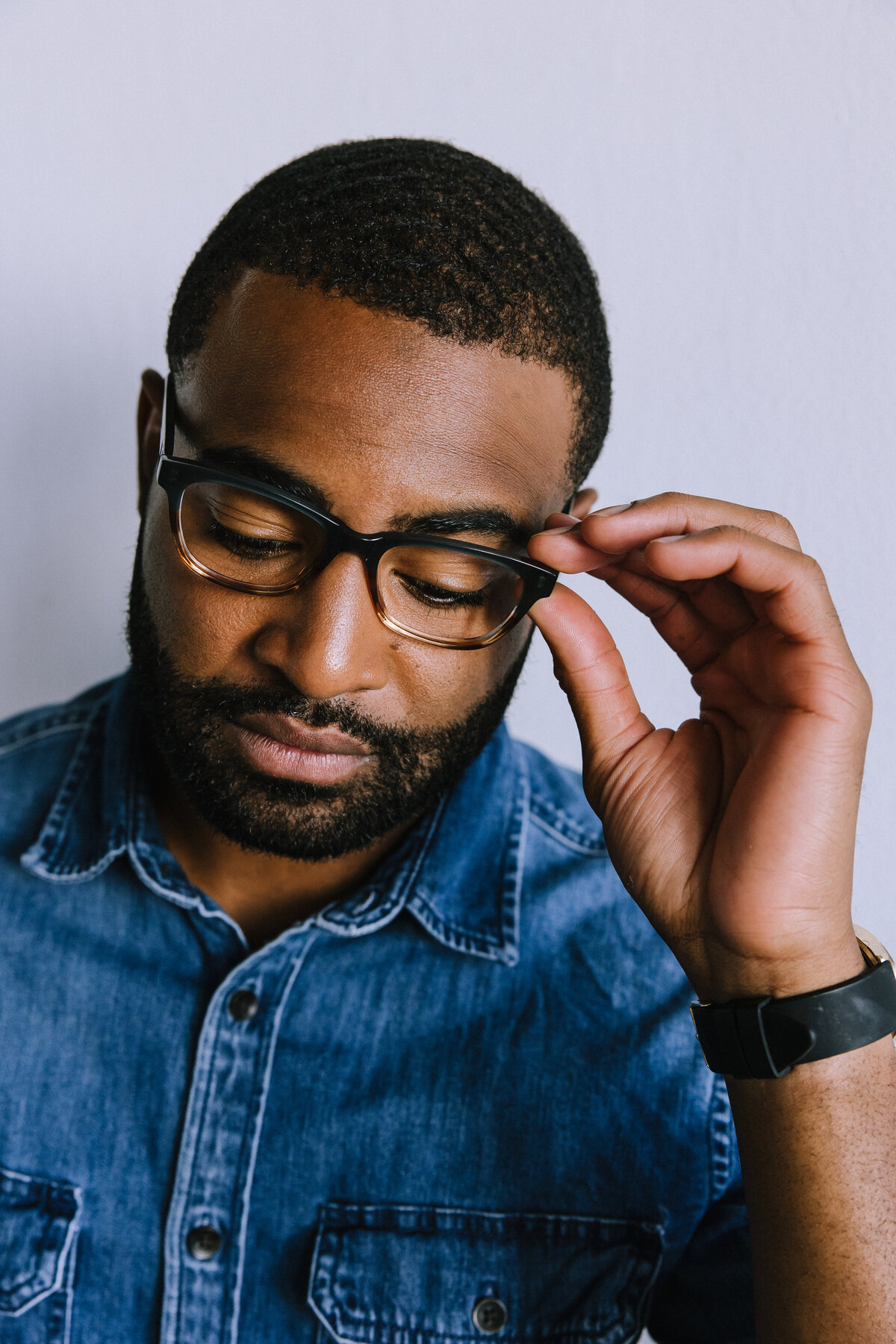 Man wearing glasses for branding photos for North Point Eyewear of Pittsburgh. 