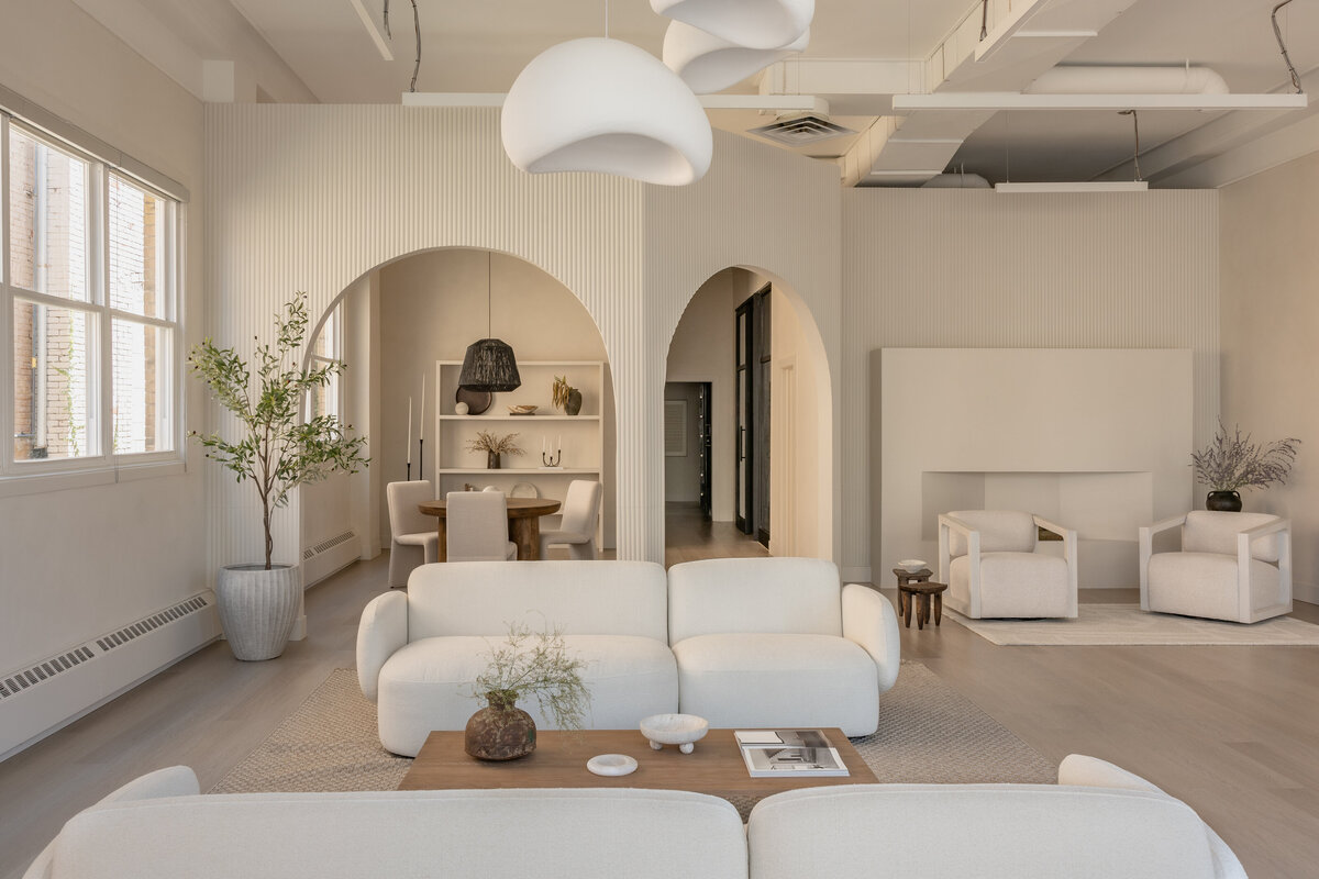 backyard patio with two sofas and accent chairs with coffee table in the center