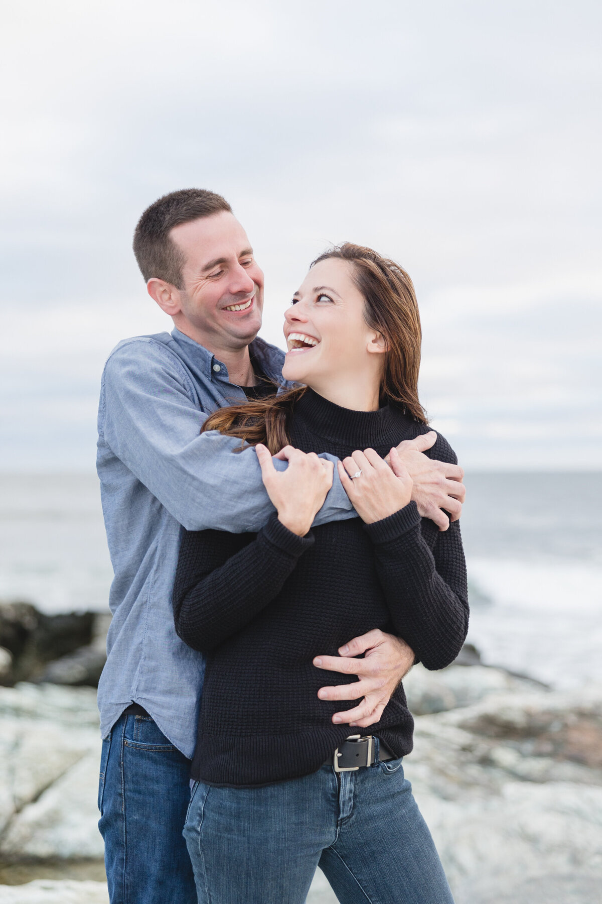 Couple in love during their Newport Engagement session