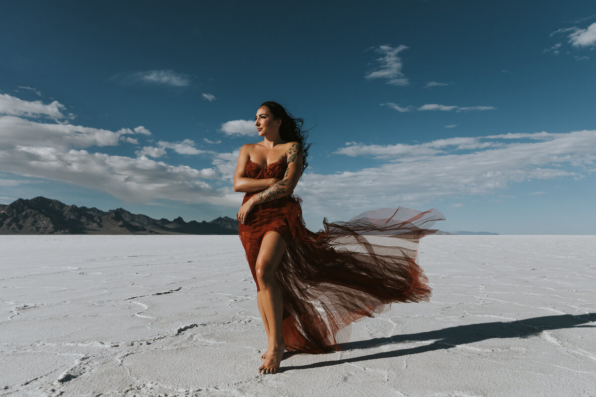 woman wearing a red dress at the Bonneville salt flats