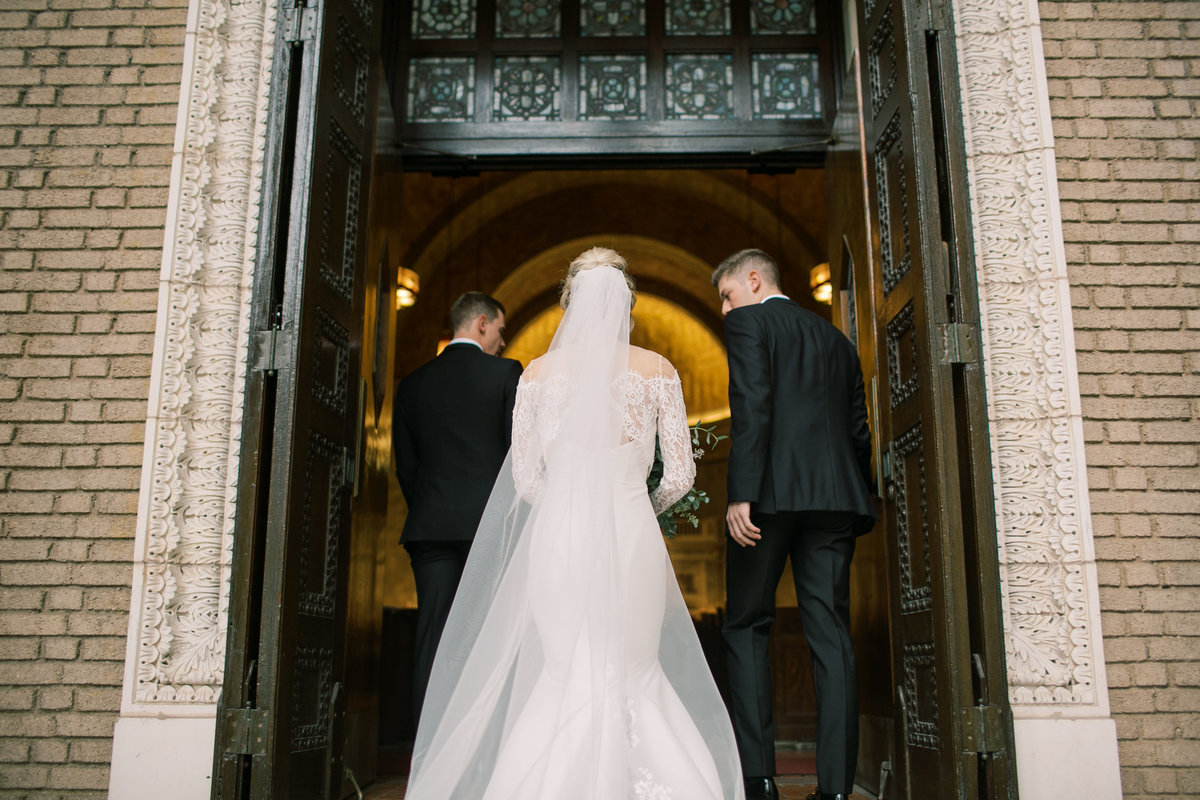 bride and groom walking into wedding ceremony