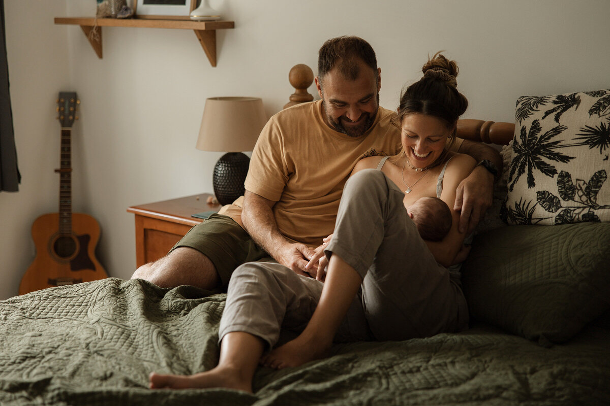 newborn baby with parents