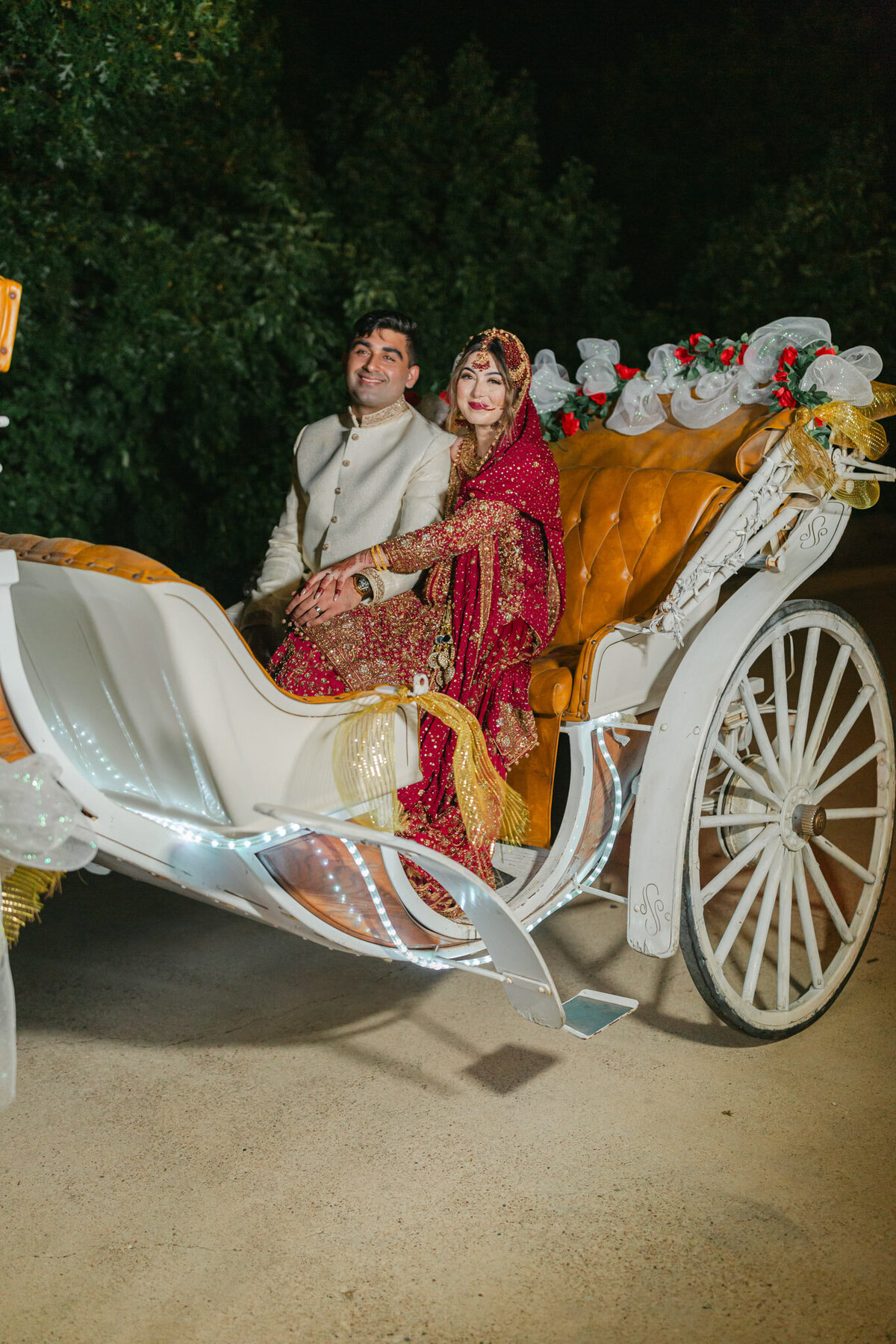 texas wedding couple riding away in a carriage