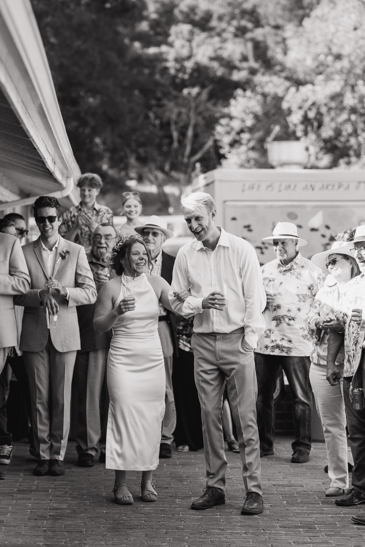 Guests laughing at wedding