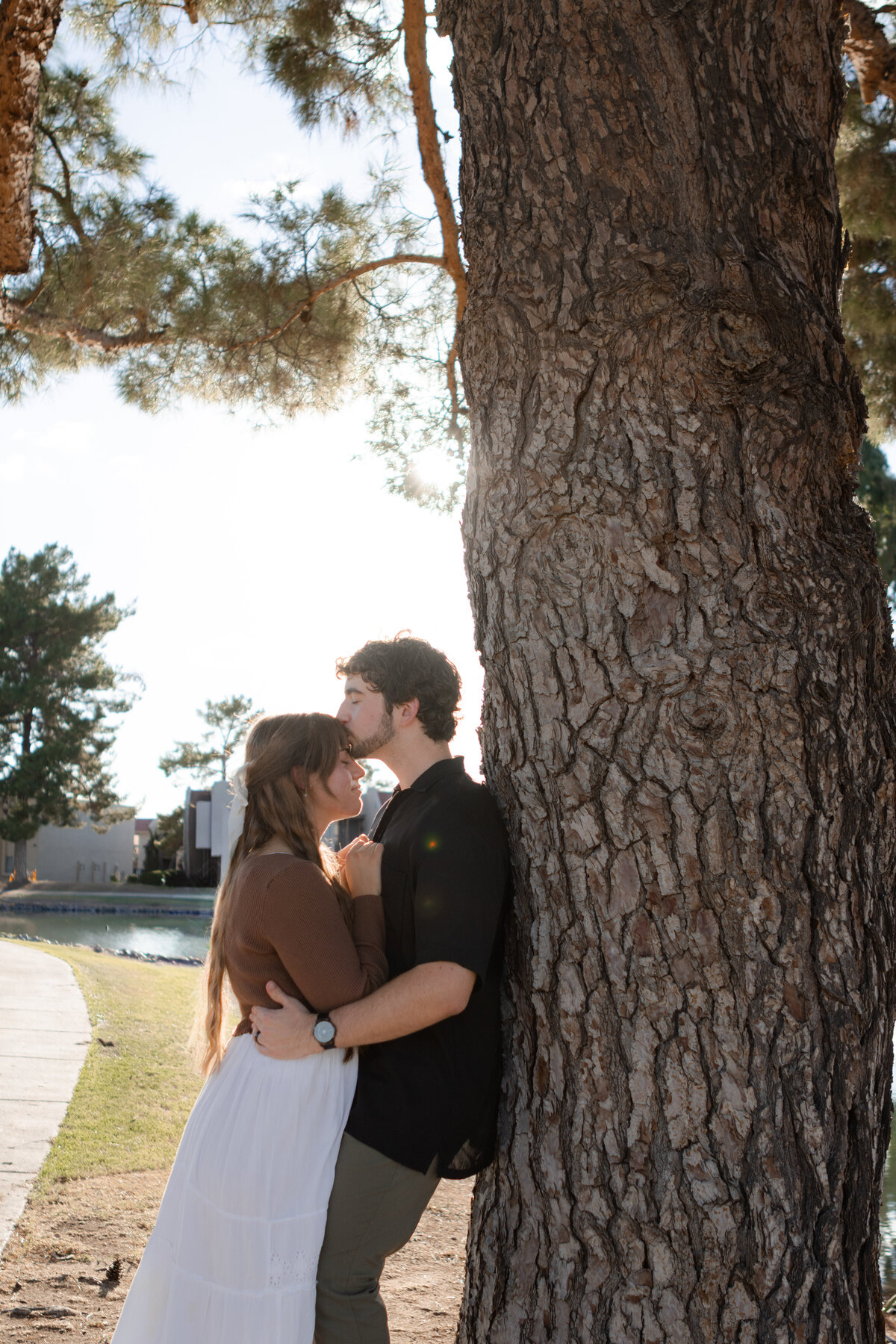 Jovanna G Photography. Classic, sophisticated Wedding Photos. Soft romantic engagement photos. Soft romantic WeddingPhotos. Sophisticated Wedding Photographer. Professional Wedding Photographer. Destination Wedding Photographer. Luxury Wedding photographer. Traveling Wedding Photographer. AZ Wedding Photographer. Gilbert AZ Wedding Photographer. Queen Creek Wedding Photographer. Phoenix Wedding Photographer. Scottsdale Wedding Photographer. Flagstaff Wedding Photographer. SoCal Wedding Photographer. California Wedding Photographer. Northern California Wedding Photographer. Southern California Wedding Photographer. San Francisco Wedding Photographer. Bay Area Wedding Photographer. San Jose Wedding Photographer. Golden Gate Bridge Wedding Photographer. Beach Lover Wedding Photographer. Palace of the Fine Arts Wedding Photographer. Ocean Lover. I love California. Orange County Wedding Photographer. Newport Beach Couples Photographer. Newport Beach Wedding Photographer. Laguna Beach Couples Beach Engagement Photographer. Laguna Beach wedding beach photographer. Los Angeles Wedding Photographer. Young and in love engaged couples who live in southern California. Christian Young Couple. Young Engaged Couple. Engaged High School Christian Couple. Christian Values. Young conservative Christian women. Young Conservative Christian men. Young Conservative Christian Couple. Young Christian Couple Engaged in High School. Young Christian College Couple. Lakeside Lovers in the Autumn Sun. David & Grace - engagement photos. Jovanna G Photographer Engagement Photos. Arizona sun shining through autumn trees- engagement. Chandler, AZ Engagement Photos. Chandler, AZ 2026 bride. Chandler, AZ Wedding Photographer. Chandler, AZ Young Engaged Couple. Girl in her 20s. Engaged Arizona Girl in her 20s. Lakeside Engagement photos. AZ Lakeside Engagement Photos. AZ Weeping Willow Lakeside Proposal. Arizona Lakeside Proposal with weeping willow tree. Detail shot of engagement ring on Arizona Lakeside estate. Chandler, AZ Lakeside Estate Proposal Outfit Inspiration.