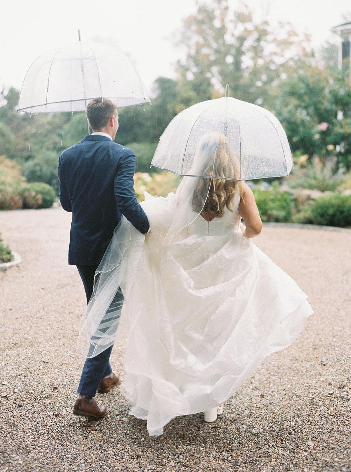 Kate_Murtaugh_Events_Cape_Cod_tented_wedding_bride_groom_rainy_day