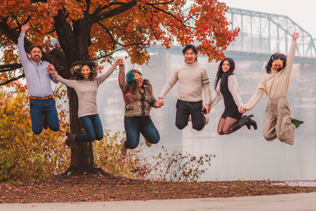 a family poses during a photo shoot in chattanooga