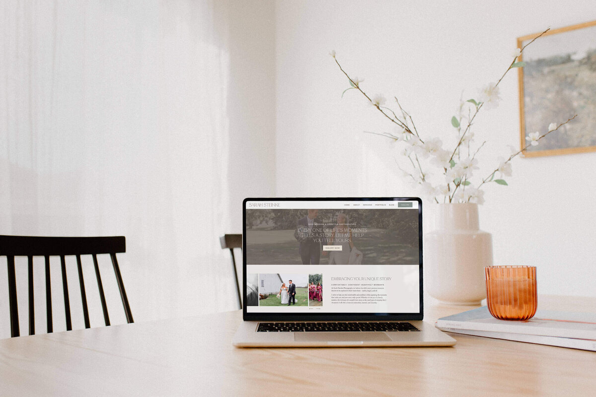 web design with a refined monogram and minimalistic typography