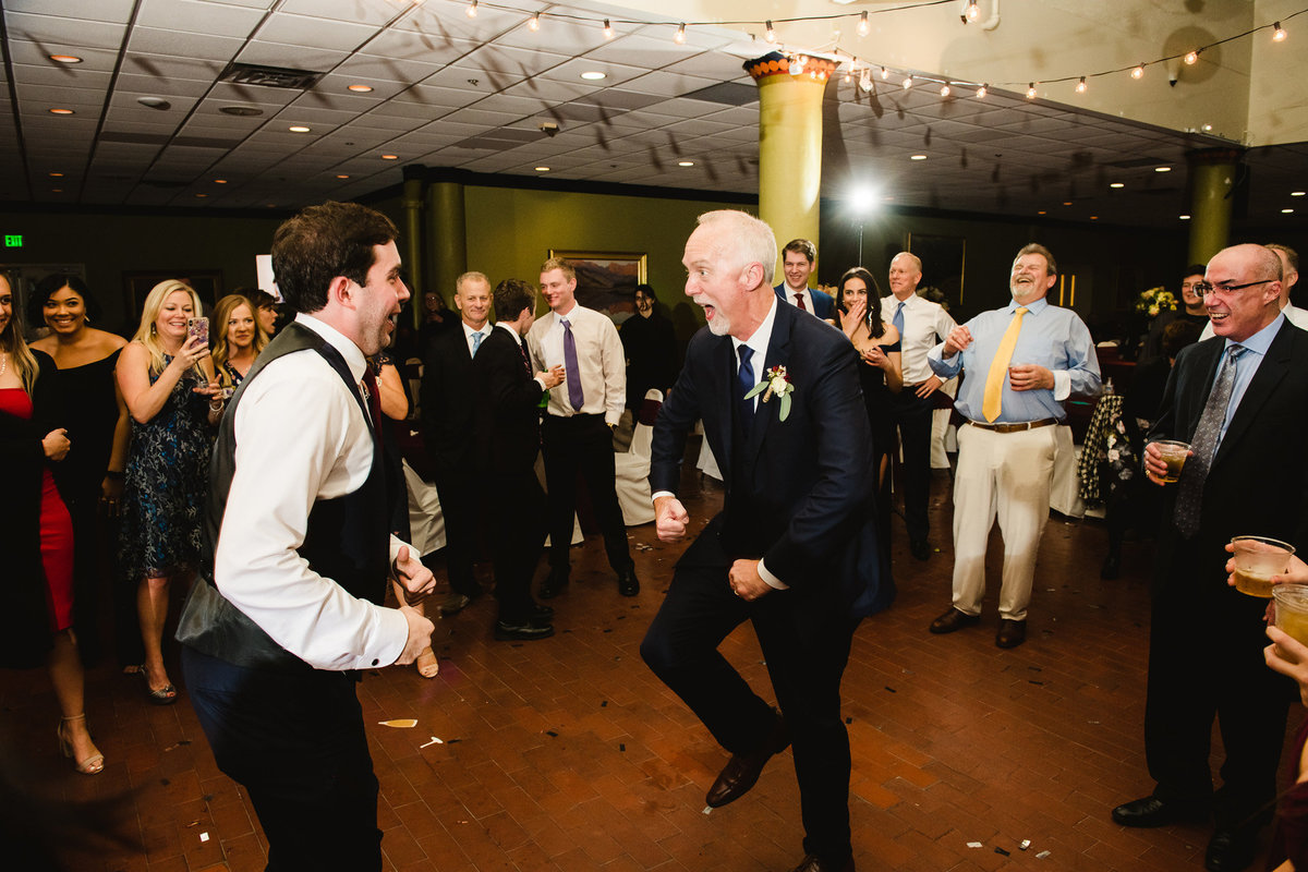 father of the groom dancing