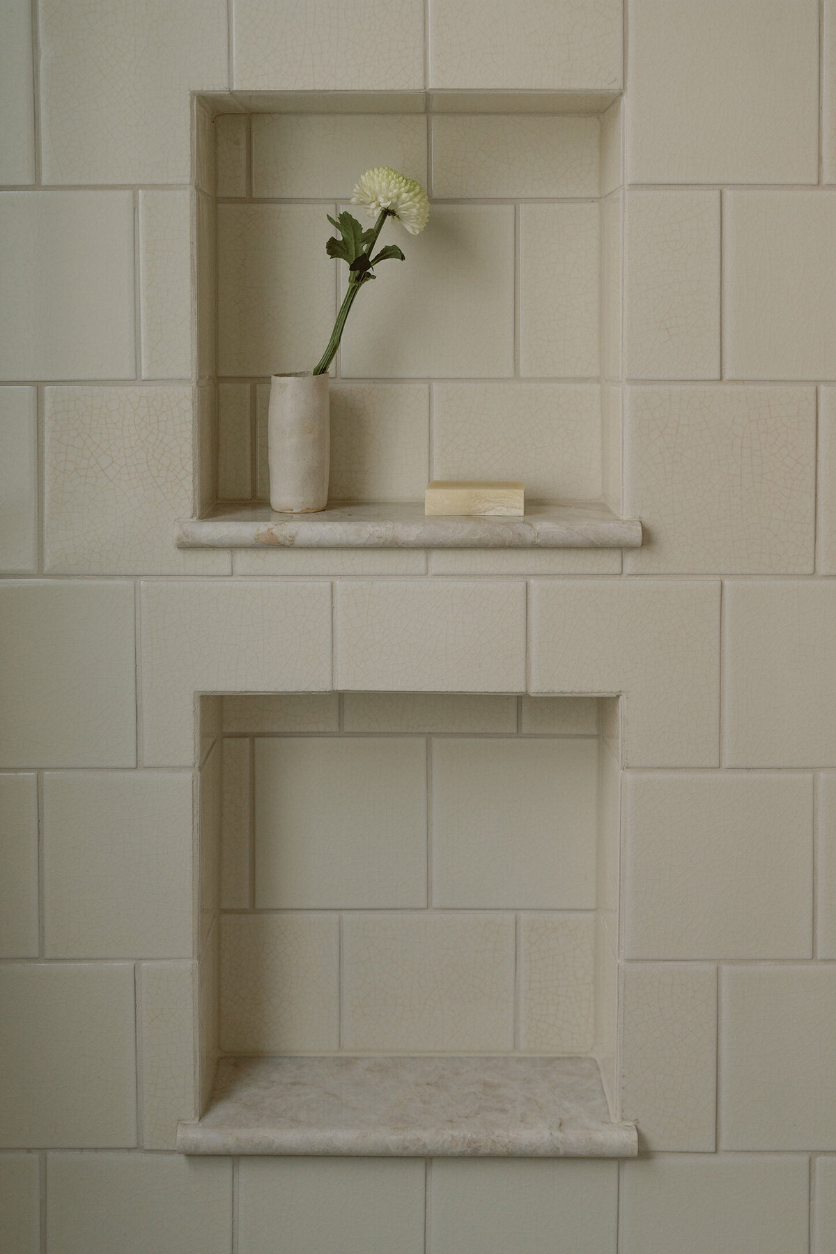 House-Franc-historical-bathroom-remodel-renovation-green-bronze-vanity-taj-mahal-quartzite-shower-niche-fireclay-tile-crackle-tile-traditional-modern-bathroom-phylrich-warm-cozy-austin-texas