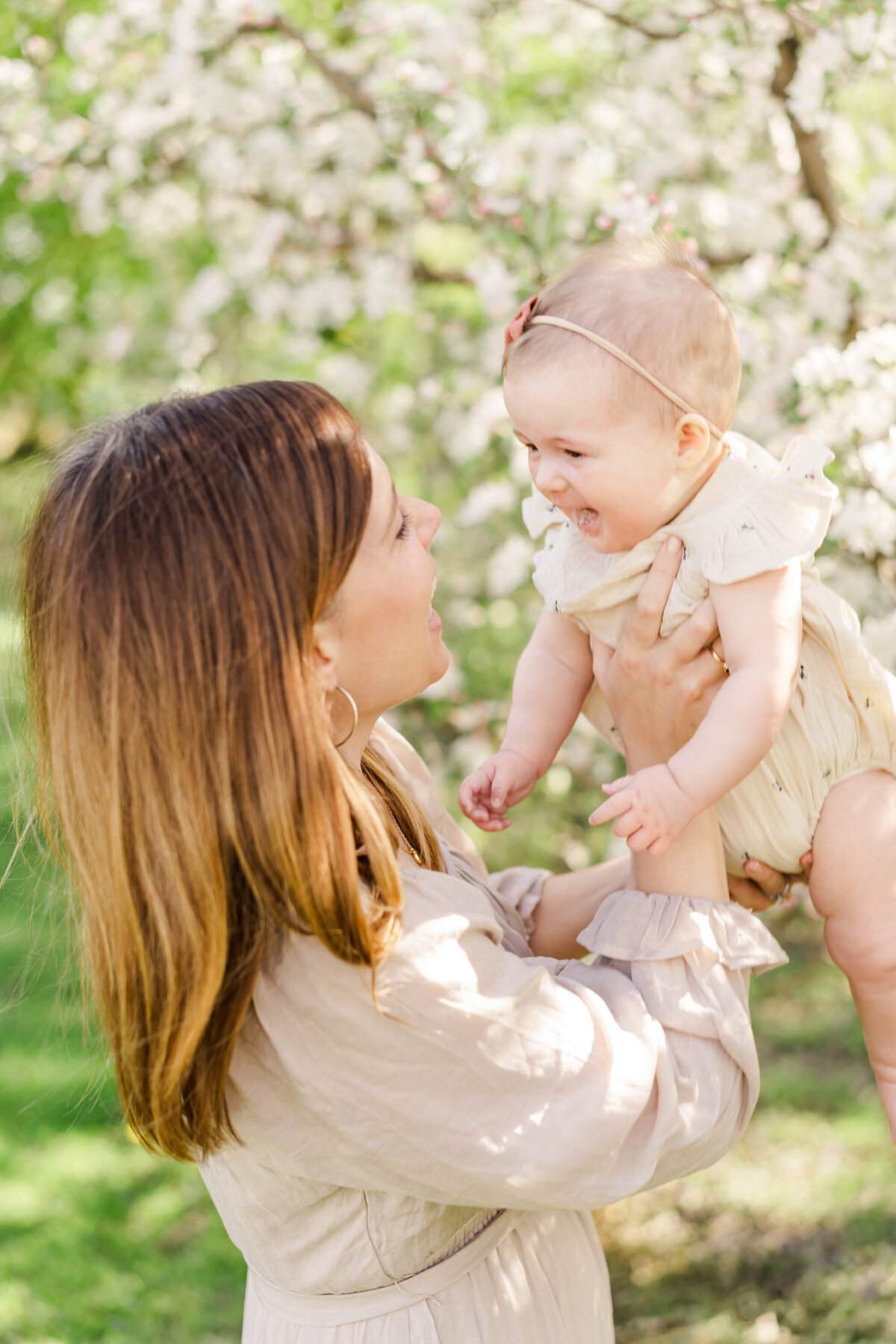 mother and child in a joyful pose