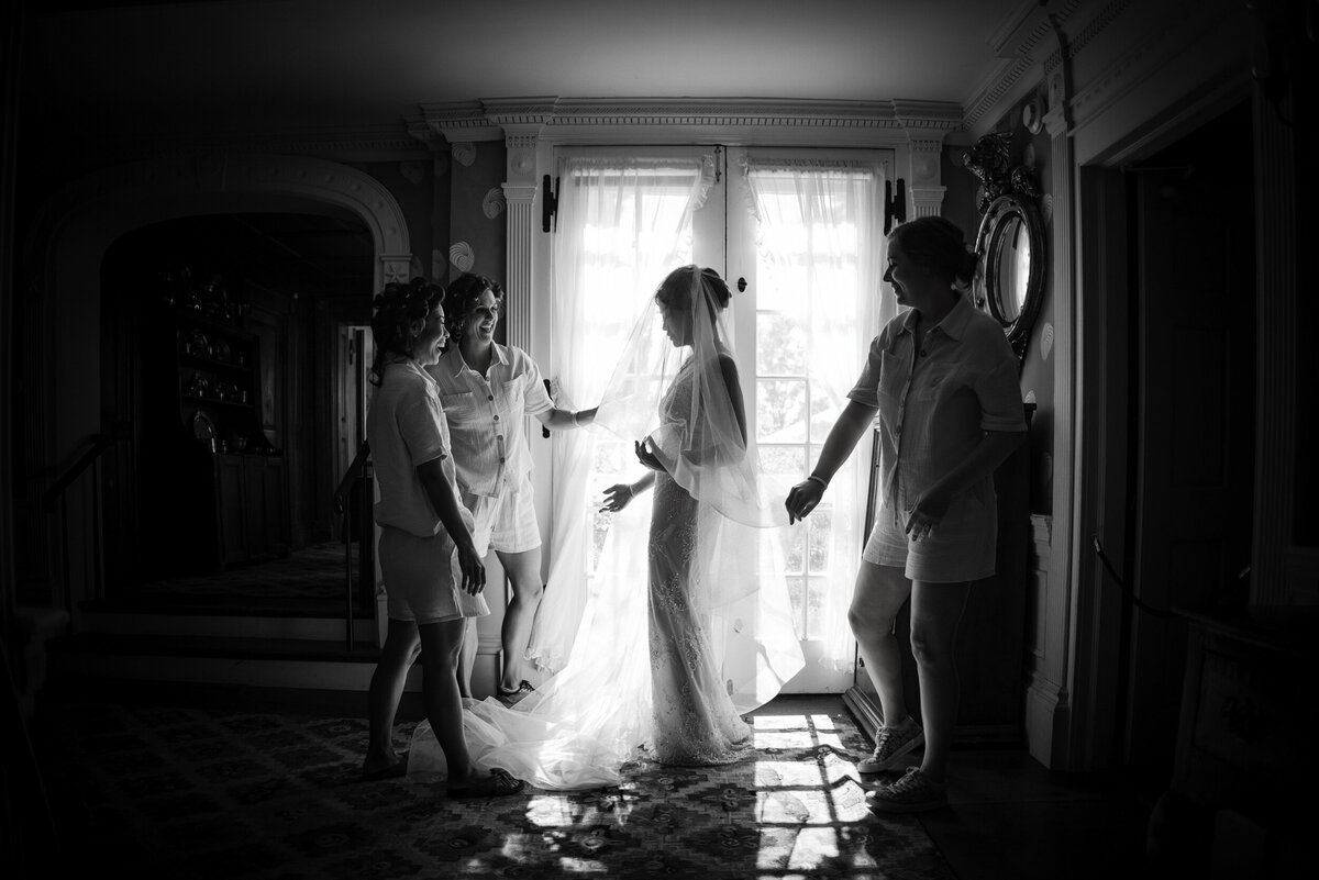 A bride getting ready  at a destination wedding in Vermont