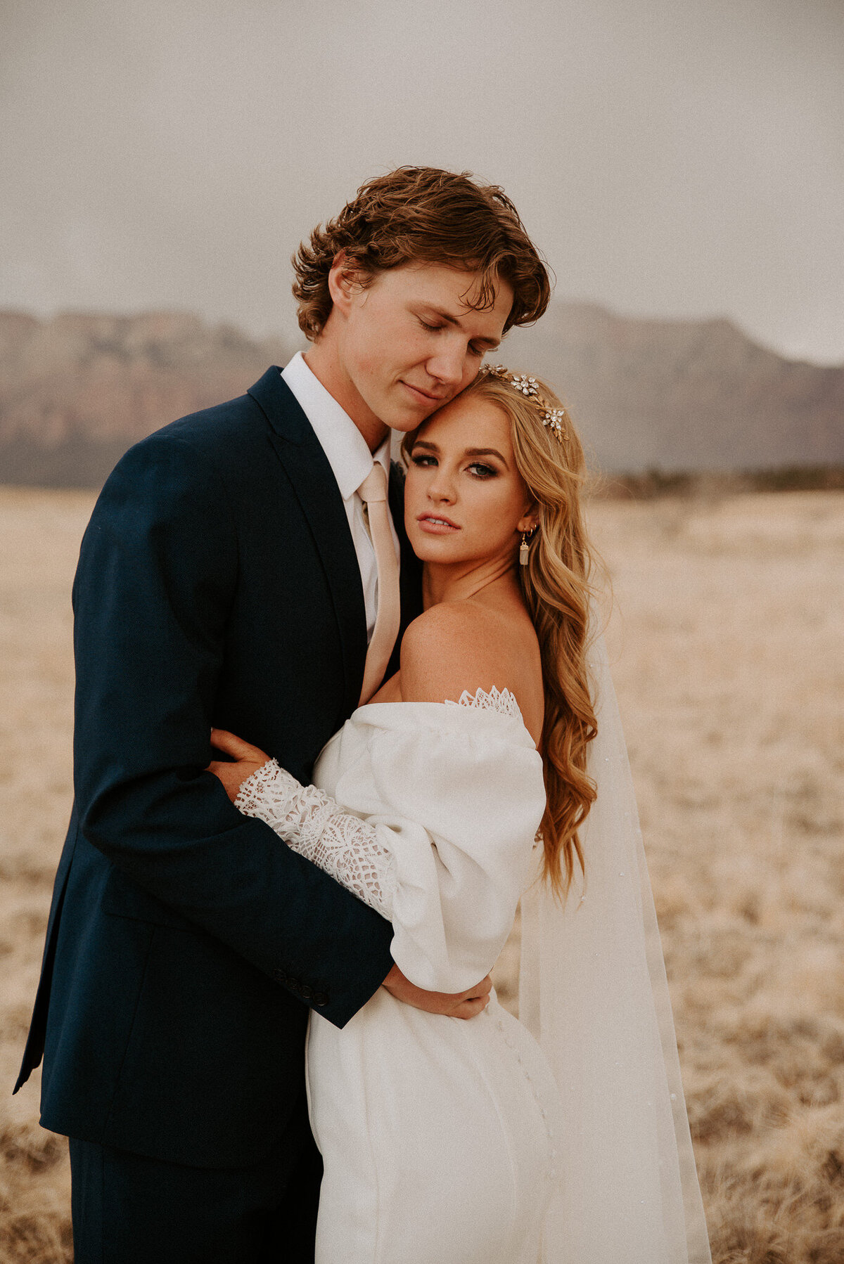 Ceremony outside of Zion National Park, bride and groom intimate moment.