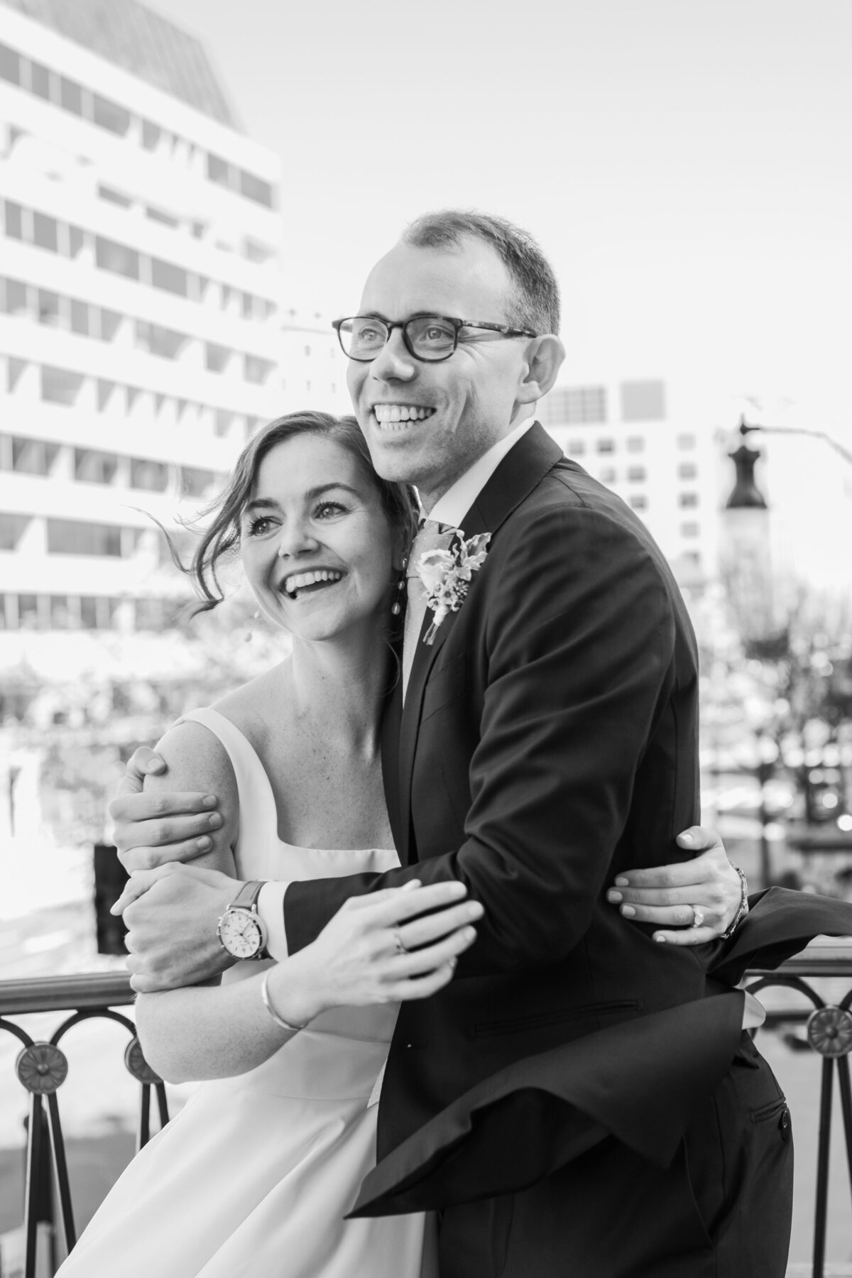 bride and groom at Washington DC MLK monument wedding with cherry blossoms