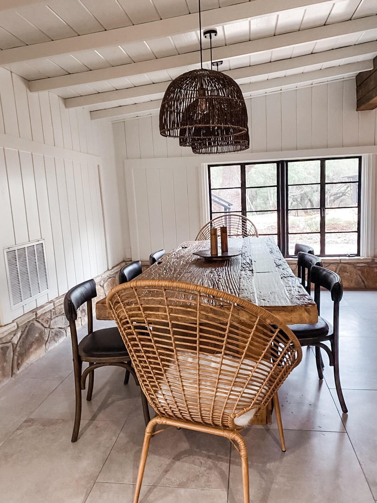 Large Kitchen table with ten black chairs