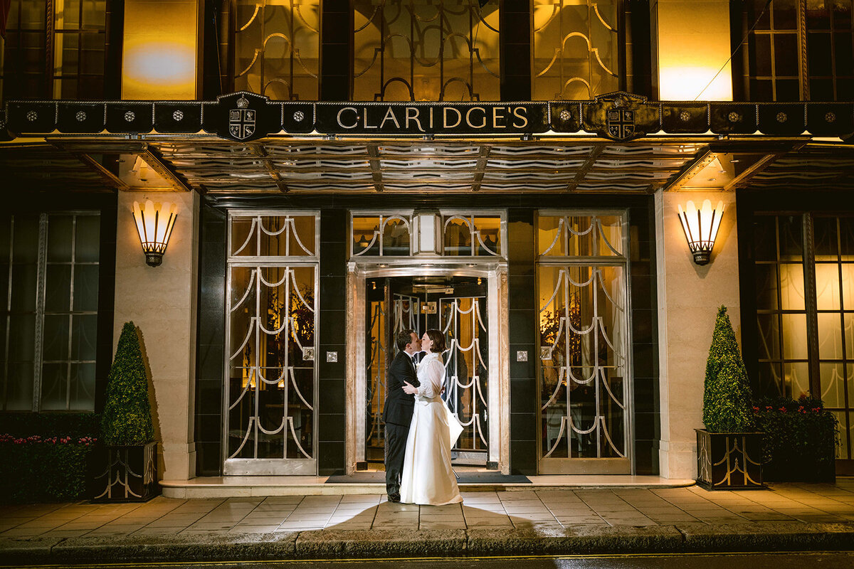 An evening photograph taken at a wedding in front of Claridges
