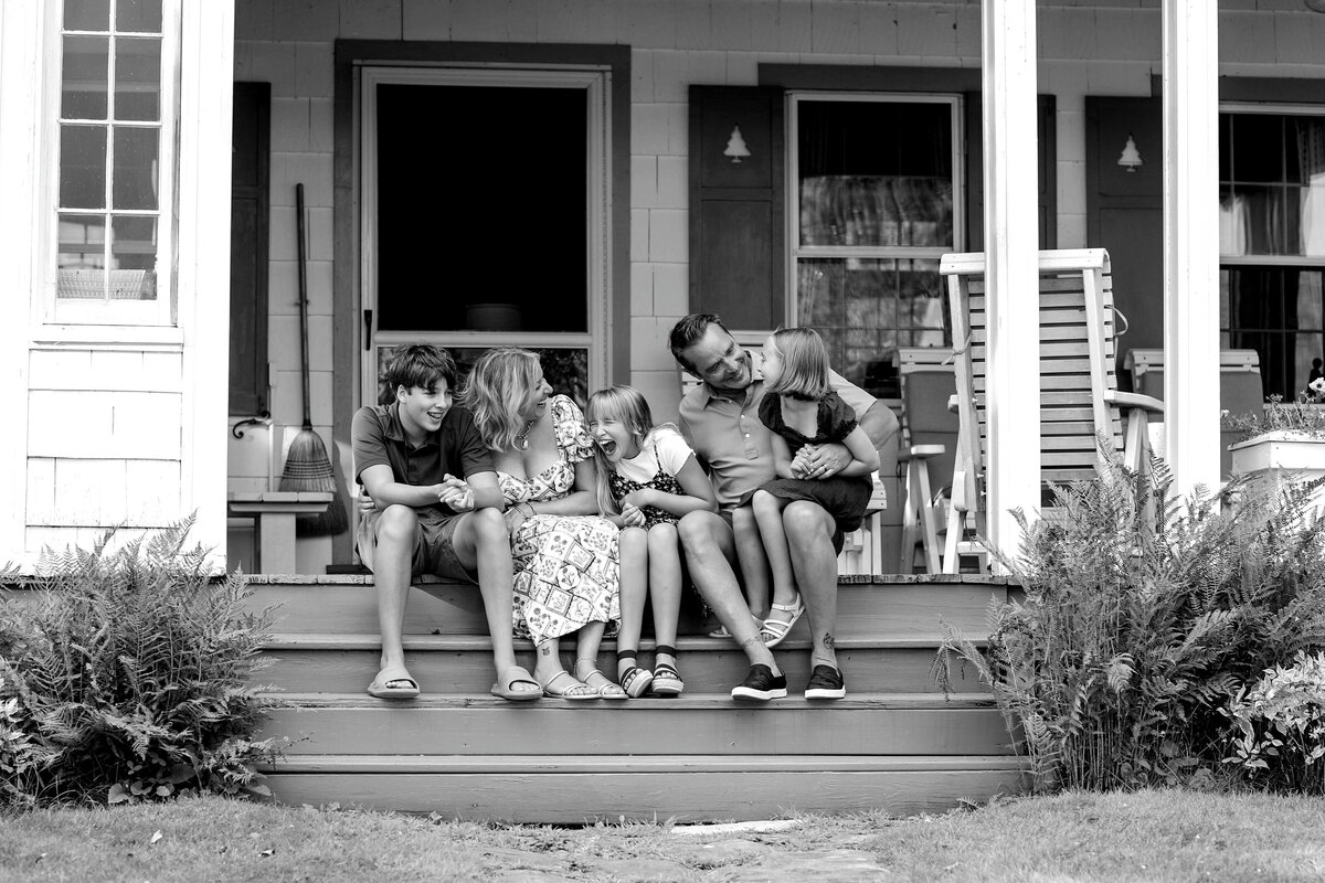 Family Sitting Together on a Porch | Taken by Maine Photographer
