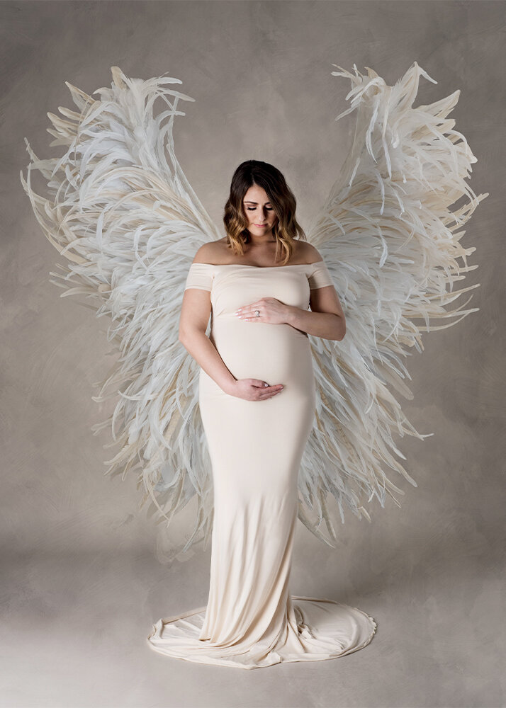 maternity-image-with-beige-dress-and-angel-wings