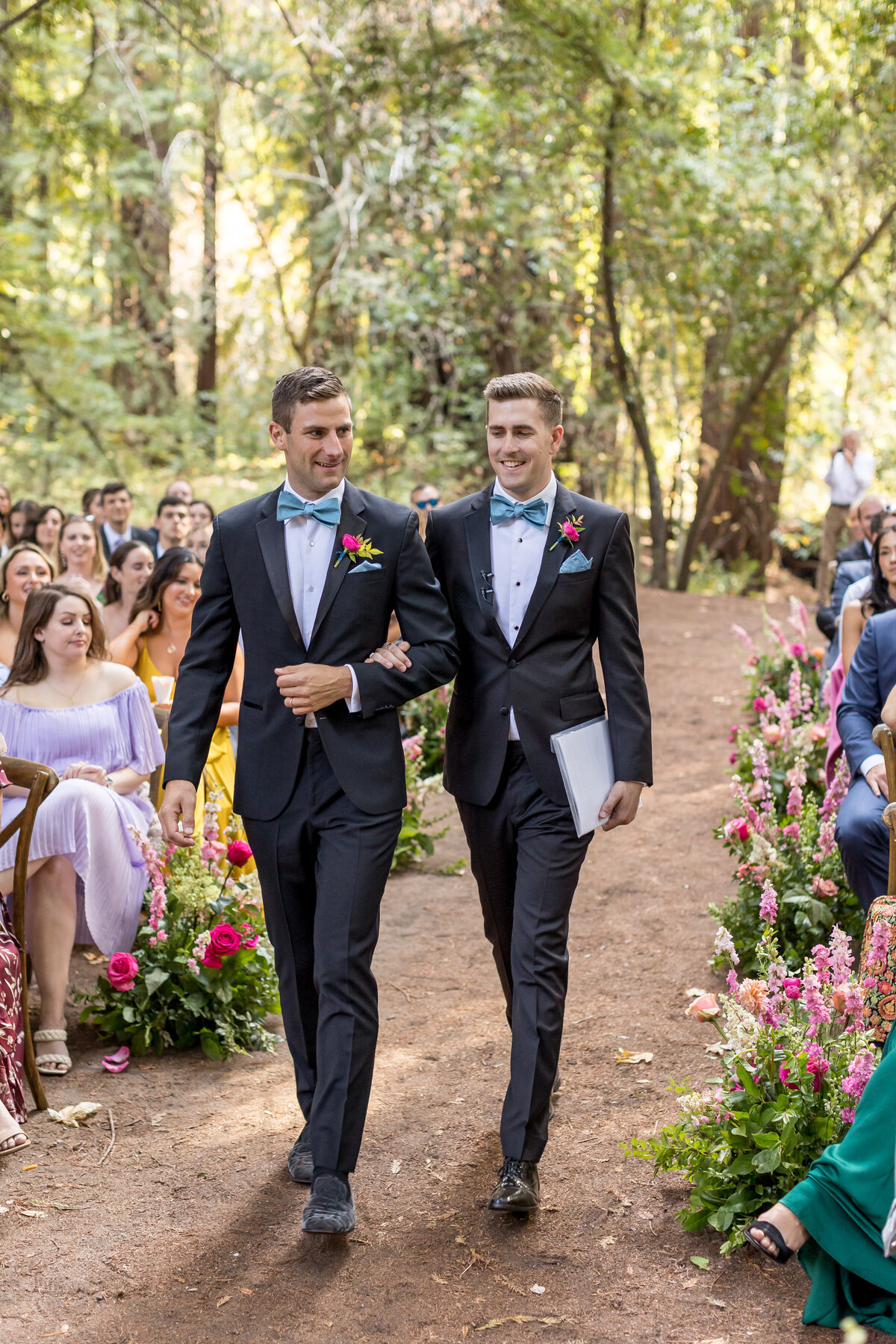 Two Men walking down the aisle