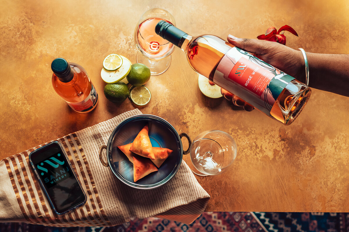 Artistic product photography of a rose splash, created in Seattle for brands that want bold, visually stunning images to showcase their products and attract attention.