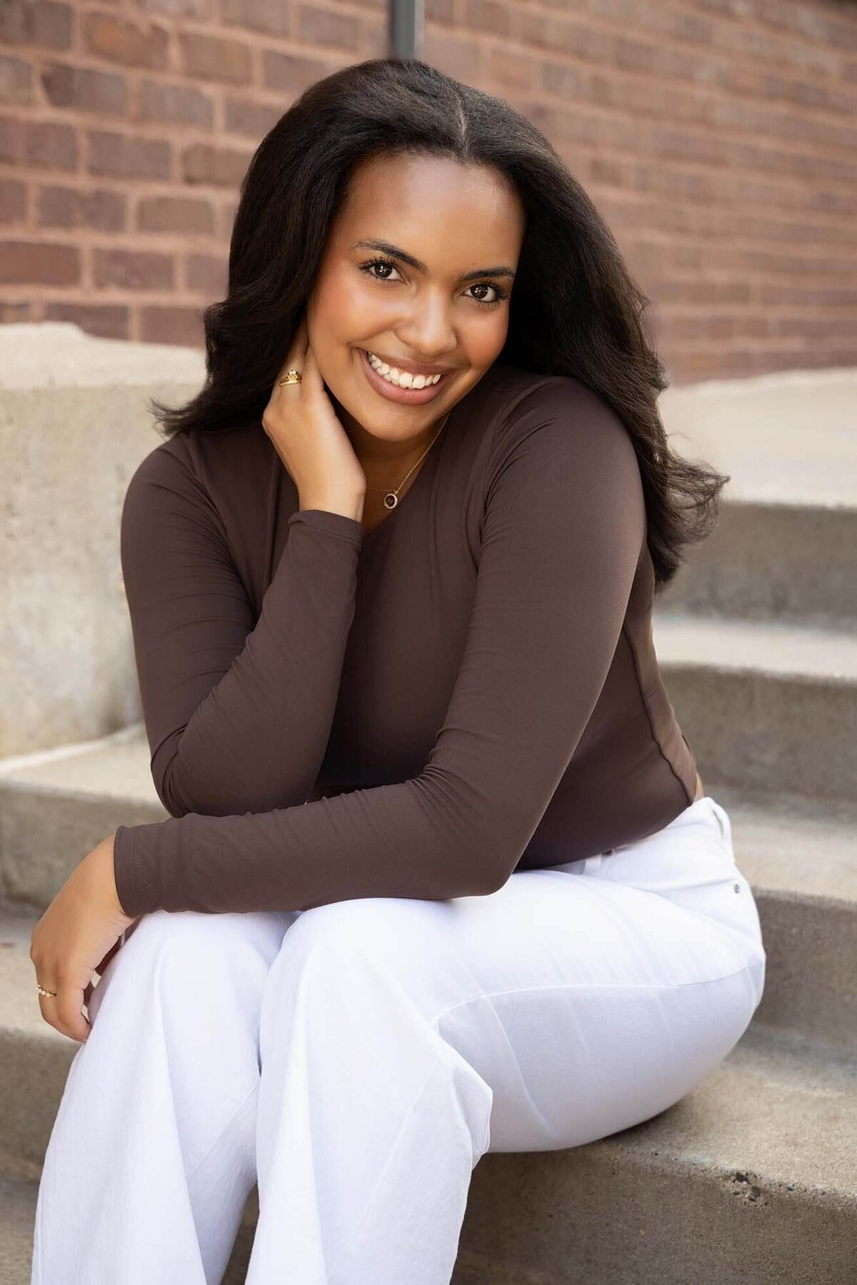 bright-senior-girl-in-brown-and-white-outfit