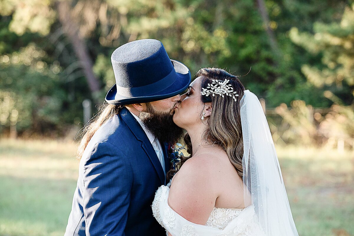 Bride and groom kissing at Bending Branch Ranch