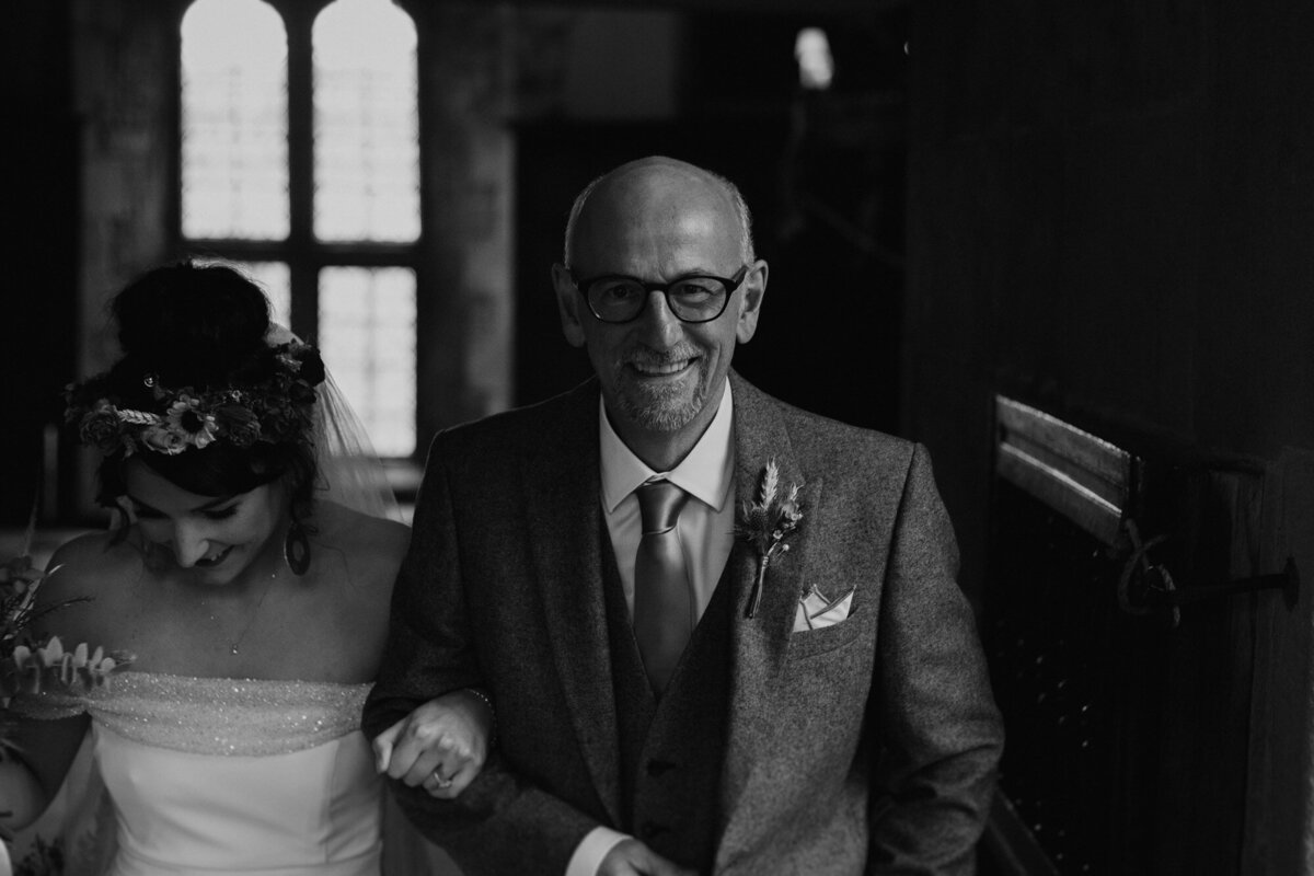 father of the bride smiling