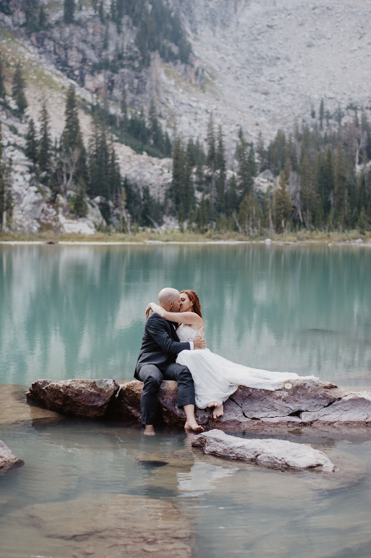 Jackson Hole Photographers capture couple kissing and hugging
