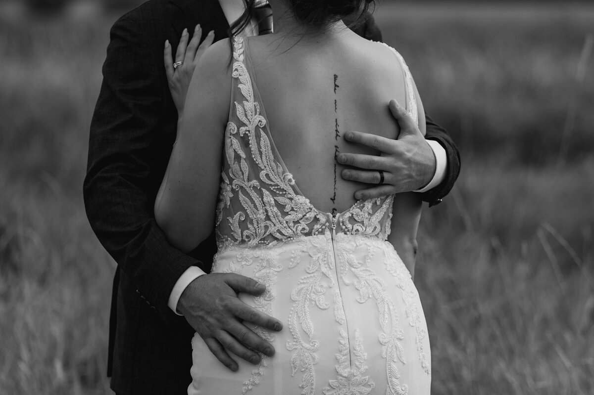 detail shot of bride and groom in black and white